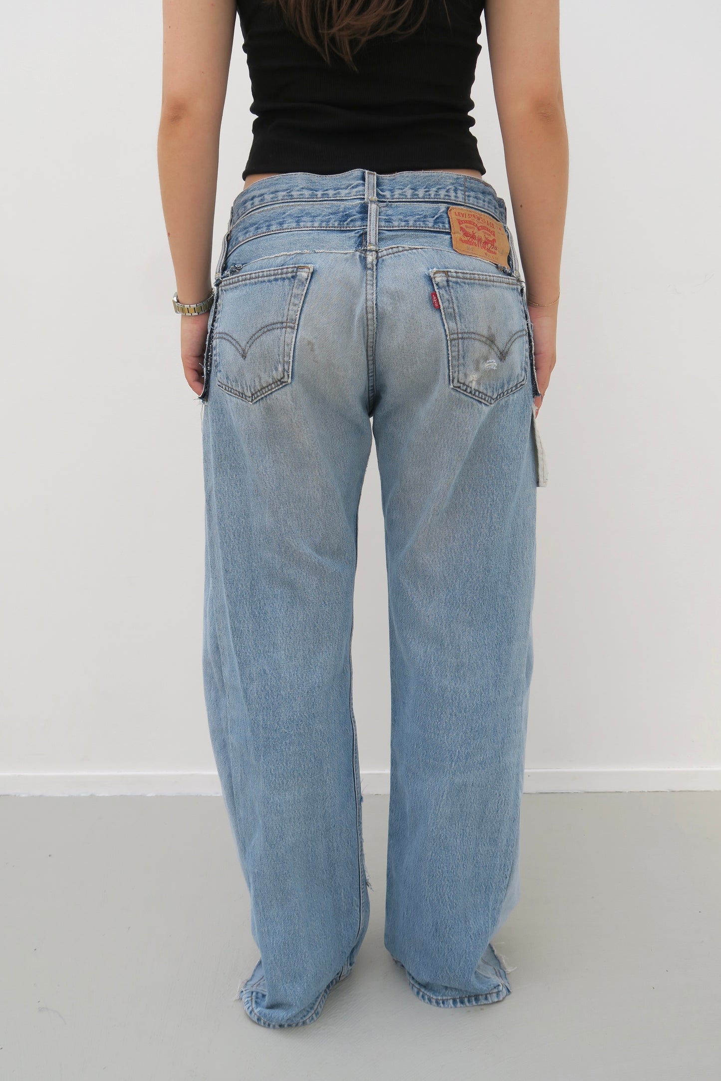 layered - reworked jeans